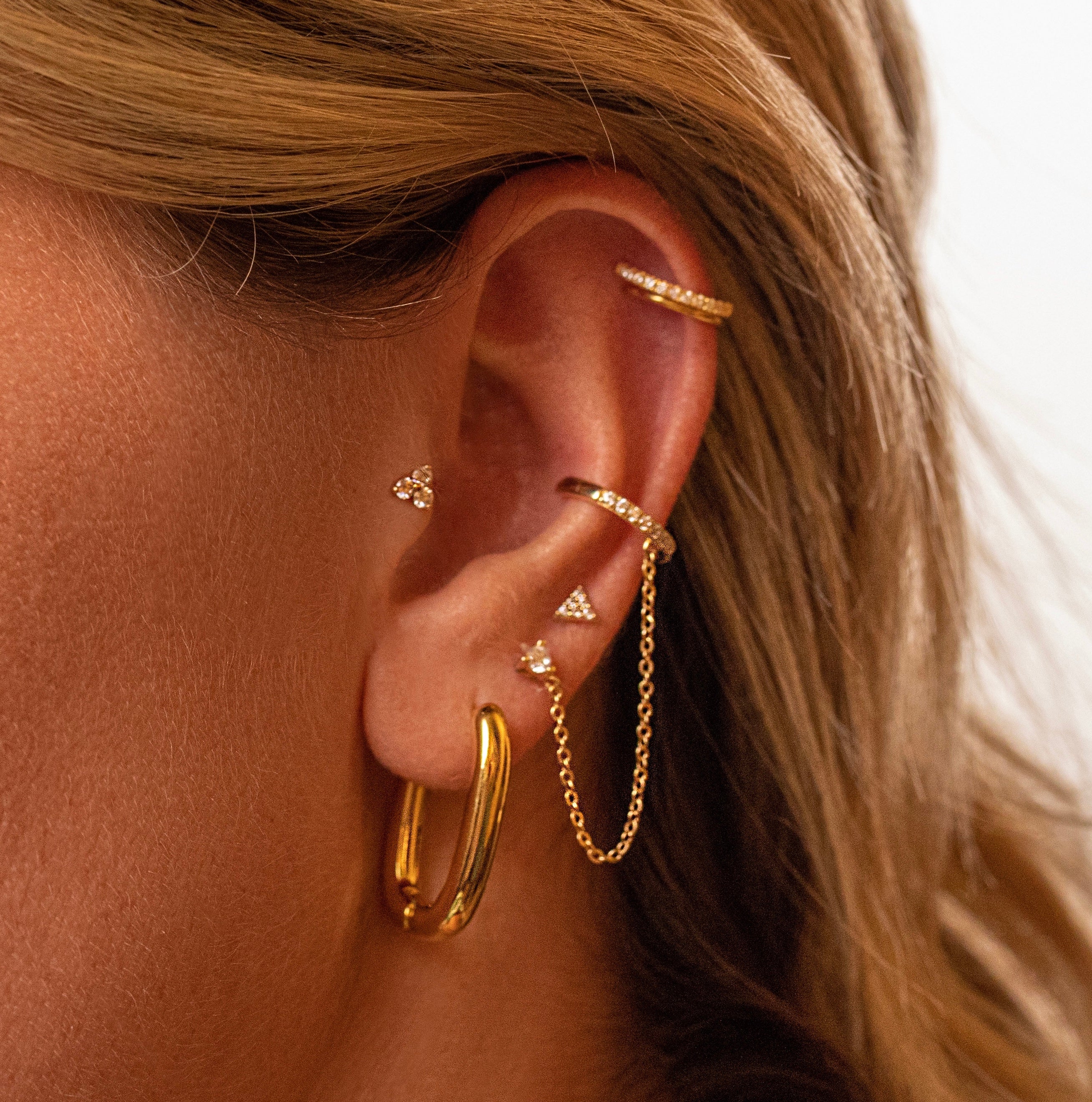 Huggies, Gold Oval Huggies  hoops for a chic look - Lulu Ave Body Jewelery