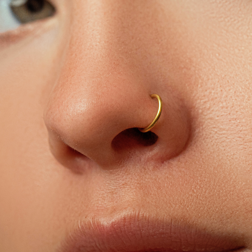 Nostril Jewelery: Silver nose ring with intricate design - Lulu Ave Body Jewelery